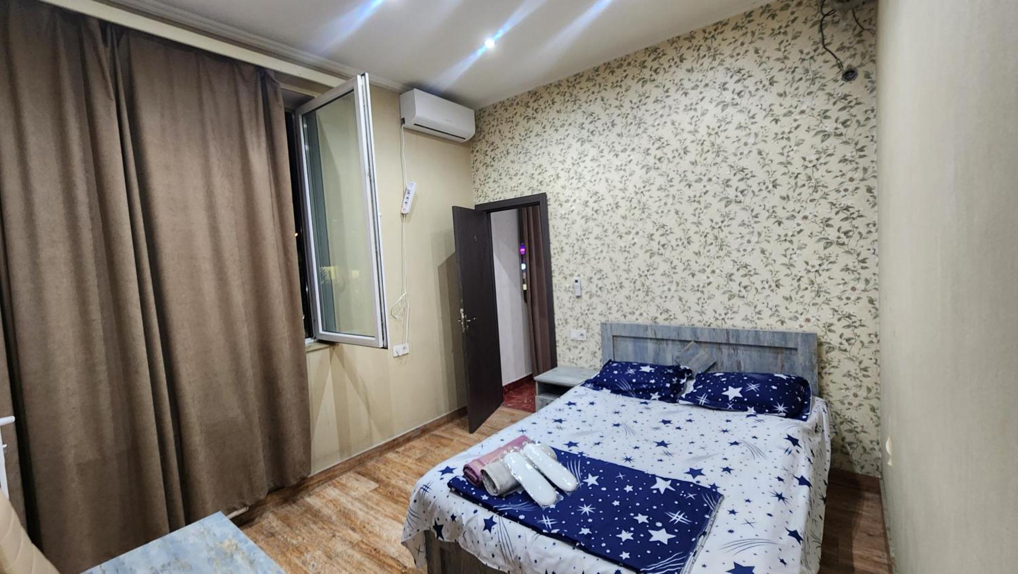 Hotel ,,Mega" Тбилиси Экстерьер фото